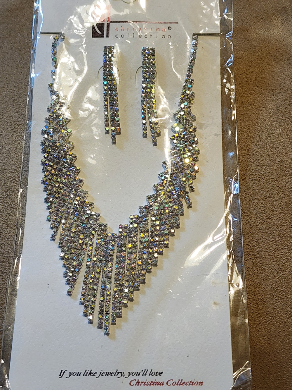 Christina Collection rhinestone waterfall necklace and matching earring set.